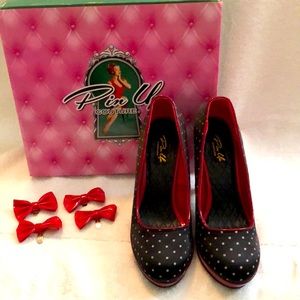 Black with white polkadot, red platform and heel. For a removal red bows.